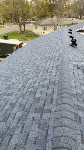 After Project Completion of an Urgent Cold Weather Roof Repair – photo taken across the roof ridge-line.